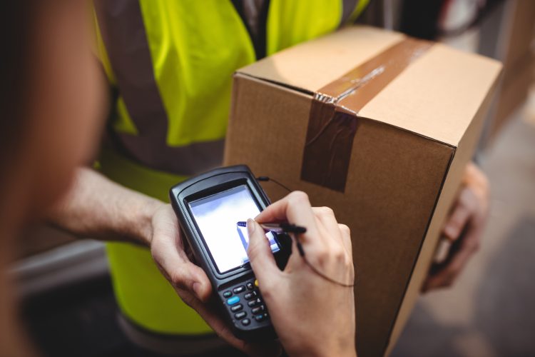 How has information technology transformed the package delivery business?