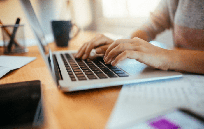 Person using a computer at a desk