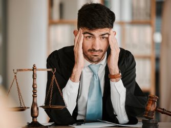 Judge man, stress headache and office for thinking, solution or problem solving with worry for case.