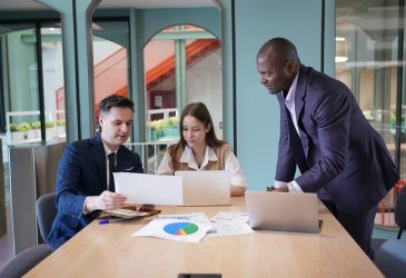 Business people in the workplace are discussing a working strategy for doing business